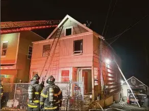  ?? Norwalk Fire Department / Contribute­d photos ?? Fire officials responded to a blaze at a home on Lexington Avenue Tuesday evening that gutted a multi-family home and left nine residents displaced.