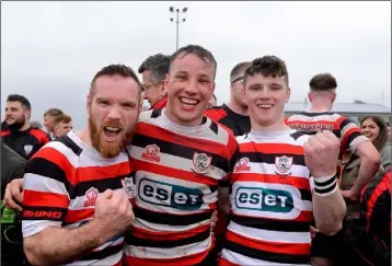  ??  ?? Hugh O’Neill, Brian Bolger and Billy Wickham of Enniscorth­y RFC celebrate following the Bank of Ireland Provincial Towns Cup final.