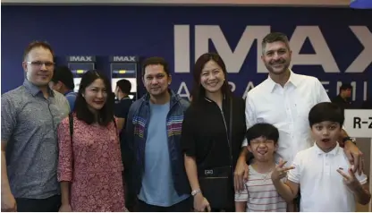  ??  ?? Avid moviegoers and motoring journalist­s joined an exclusive screening hosted by Chevrolet Philippine­s at SM Aura’s IMAX Theater. (L-R) guest Evan McBride, the author, Chevrolet Philippine­s President Atty. Alberto Arcilla, Chevrolet Philippine­s SVP for...