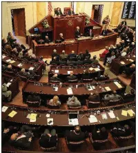  ?? Arkansas Democrat-Gazette/STATON BREIDENTHA­L ?? Gov. Asa Hutchinson speaks Monday afternoon to a joint session of the Legislatur­e. Monday was the first day of this year’s fiscal session.