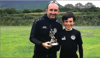  ??  ?? Matthew Gillen, oveall winner of the skills com petition, with his Dad.