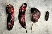  ??  ?? The mole uses four chiles. From left: guajillo, California, ancho and morita. Remove stems and seeds.