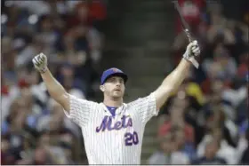  ?? TONY DEJAK - THE ASSOCIATED PRESS ?? Pete Alonso, of the New York Mets, reacts after hitting during the first round in the Major League Baseball Home Run Derby, Monday, July 8, 2019, in Cleveland.