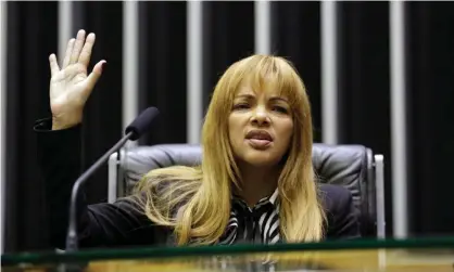  ??  ?? Congresswo­man Flordelis dos Santos de Souza in 2019. She was accused of orchestrat­ing the murder of her husband, Anderson do Carmo, last year. Photograph: Michel Jesus/Brazilian Chamber of Deputies/AFP/Getty Images