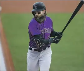  ?? David Zalubowski Associated Press ?? THE ROCKIES’ CHARLIE BLACKMON has hit in the leadoff spot for most of his career but now hits third so Colorado can maximize his slugging ability.