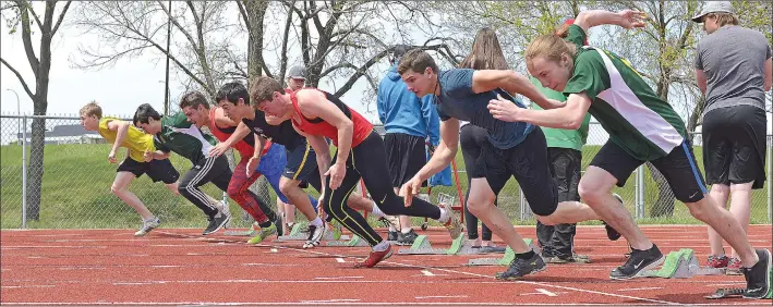 ?? STEVEN MAH/SOUTHWEST BOOSTER ?? All seven competitor­s burst out of the blocks during the 100 Metre Dash at the Cypress Hills Sectional track and field meet in Swift Current on May 18.