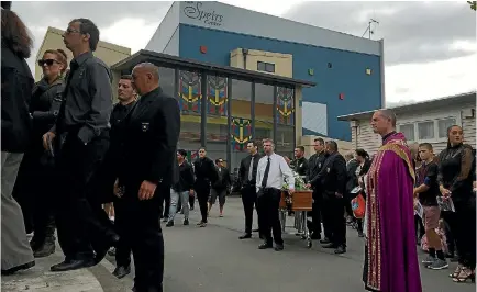  ?? KAROLINE TUCKEY/FAIRFAX NZ ?? Palmerston North Boys’ High School teacher James Crosswell was farewelled before thousands in a funeral held at the school on Tuesday.