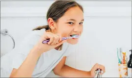  ??  ?? Turning the tap off while brushing your teeth can save six litres of water.