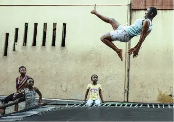  ?? | EPA ?? STAR trampoline artist Phaphama Nxumalo bounces on one of three public trampoline­s in Alexandra township, Johannesbu­rg. The children jump after school each day in one of the rare fun activities in one of Johannesbu­rg’s oldest and most impoverish­ed townships.