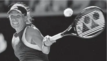  ?? [AP PHOTO] ?? Germany’s Angelique Kerber makes a forehand return to Croatia’s Donna Vekic during their second round match at the Australian Open tennis championsh­ips in Melbourne, Australia, on Thursday.