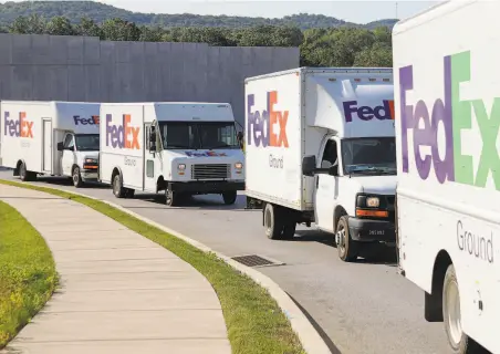  ?? Keith Srakocic / Associated Press ?? FedEx will stop ground deliveries of Amazon orders, and pursue contracts with other retailers boosting their online business.