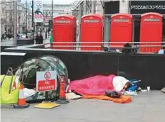  ?? Rex Features ?? Homeless in London: Around 2.6 million people in the UK are estimated to be struggling with severe problem debt.