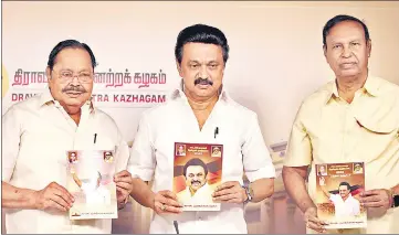  ??  ?? DMK president MK Stalin (centre) releases party's manifesto ahead of the Tamil Nadu Assembly Polls, in Chennai on Saturday.