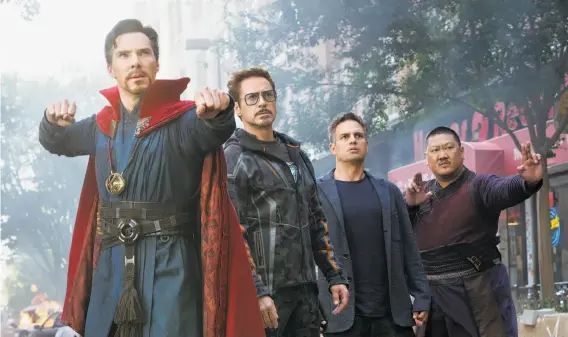  ?? Chuck Zlotnick / Marvel Studios ?? Dr. Strange (Benedict Cumberbatc­h, left), Tony Stark (Robert Downey Jr.), Bruce Banner (Mark Ruffalo) and Wong (Benedict Wong) in “Avengers: Infinity War.”