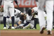  ?? SARAH STIER - THE ASSOCIATED PRESS ?? New York Yankees second baseman Gleyber Torres sits on the ground after slipping while trying to field a ground ball during the fourth inning of the team’s baseball game against the Toronto Blue Jays, Friday, Sept. 20, 2019, in New York.