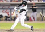  ?? CONTRIBUTE­D ?? Dragons left fielder Shane Mardirosia­n makes contact against the Lugnuts but had a tough night overall, finishing hitless in four at-bats.