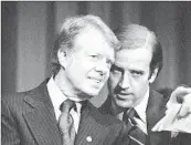  ?? BARRY THUMMA Associated Press ?? THEN-PRESIDENT Carter listens to then-Sen. Joe Biden at a fundraisin­g event in February 1978.