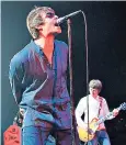  ??  ?? The Gallagher brothers on stage together before their rows led to Oasis splitting up