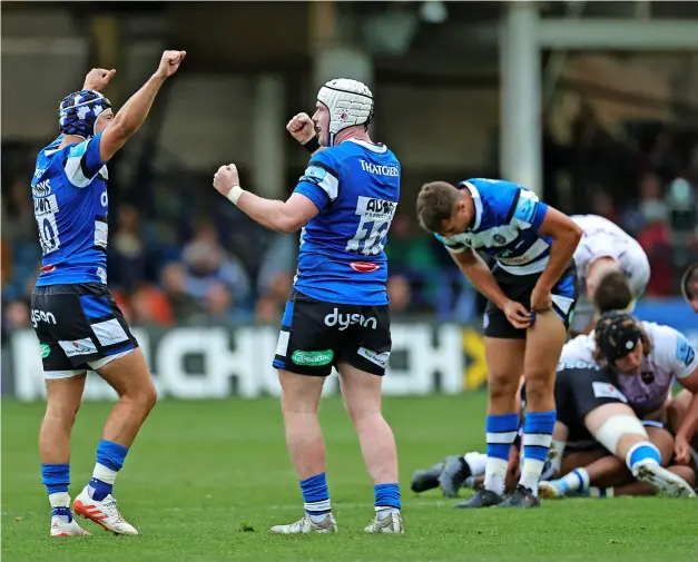  ?? PICTURE: David Rogers/getty Images ?? Debutant George Warboys (left) and Niall Annett celebrate Bath Rugby’s first victory of the season against Northampto­n Saints