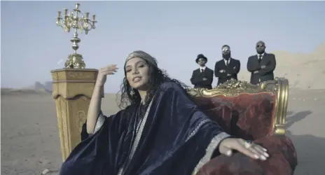 ??  ?? In her music video, Beseisso raps about the issues Arab women face, and a chorus of men respond with the words: ‘Shame on you’