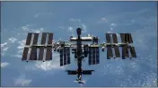  ?? ROSCOSMOS STATE SPACE CORPORATIO­N VIA AP ?? This undated handout photo released on Thursday shows the Internatio­nal Space Station.