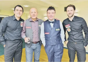  ??  ?? Ronnie O’Sullivan pictured at the Cresset on Saturday night. From the left are O’Sullivan, event organiser Lord Russell Baker of Amble Dew Events, Jimmy White and Judd Trump.