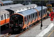  ?? NANCY LANE / BOSTON HERALD FILE ?? New MBTA orange line trains sit on the tracks at Wellington Station on April 26, 2021, in Everett.