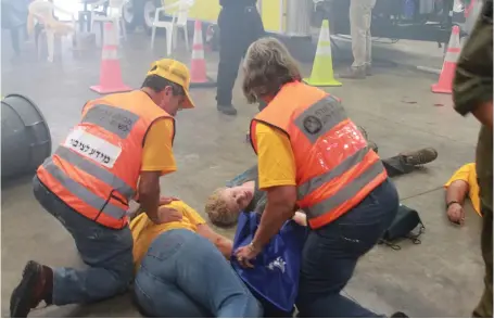  ?? (Eitan Charnoff/EVP spokesman) ?? IN ACTION: The Emergency Volunteers Project trains American and Israeli first responders to respond to mass causality incidents.