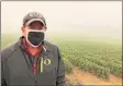  ?? Associated Press ?? Jim Bernau, founder of Willamette Valley Vineyards, at his winery blanketed in smoke from wildfires on Sept. 17 in Turner, Ore.
