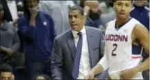  ?? STEVEN SENNE — THE ASSOCIATED PRESS ?? Connecticu­t head coach Kevin Ollie shouts from the bench during a game in 2016. Ollie and the Huskies will play Villanova for the next three seasons.