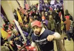  ?? Win McNamee / Getty Images ?? Protesters enter the U.S. Capitol Building on Wednesday in Washington, D.C.