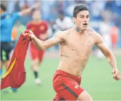  ??  ?? Roma’s Diego Perotti celebrates scoring their third goal during the Italian Serie A match between AS Roma vs Genoa at Stadio Olimpico in Rome, Italy. — Reuters photo