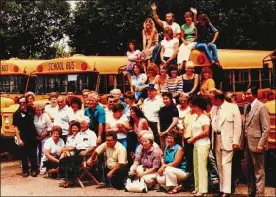  ?? CONTRIBUTE­D ?? Terry Lloyd (middle row, blue-and-white hat) recently celebrated his 50th anniversar­y of driving a bus for the Kettering School District. This group photo, taken in the late 1980s, is one of many he took with staff and students over the years.