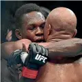  ??  ?? The respect between Israel Adesanya and Anderson Silva was obvious during and after the right.