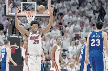  ?? MICHAEL LAUGHLIN/STAFF PHOTOGRAPH­ER ?? Third year forward Justise Winslow has shown gritty defense and offensive growth during the Heat’s first-round matchup against the 76ers.