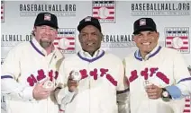  ?? MARY ALTAFFER/AP ?? Rodriguez, right, will be inducted into the Hall of Fame on Sunday with Jeff Bagwell, left, and Tim Raines.