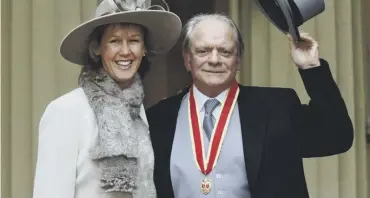  ??  ?? 0 Sir David Jason and his wife Gill after collecting his knighthood at an investitur­e ceremony in 2005, above; the actor is hoping to revive his character Jack Frost, main