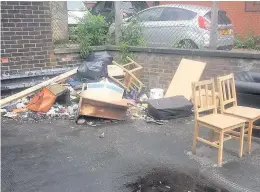  ??  ?? ●●Flytipping on Mealhouse Brow and, right, a rat rummages through the rubbish