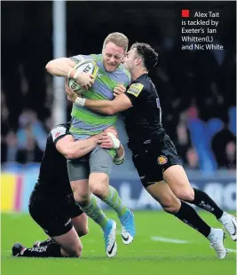  ??  ?? Alex Tait is tackled by Exeter’s Ian Whitten(L) and Nic White