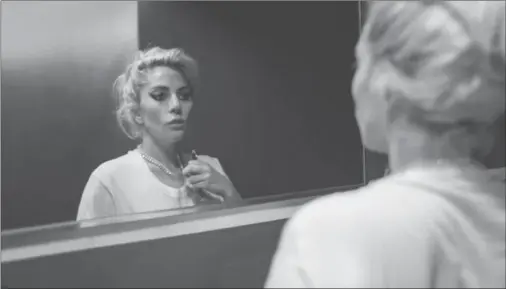  ??  ?? Lady Gaga in a scene from the new Netflix documentar­y "Gaga: Five Foot Two."