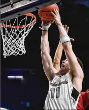  ??  ?? Alex Mangold of Lakota East powers to the hoop against La Salle in a Division I regional semifinal Wednesday.