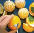  ?? Fotos: Michael Pohl ?? Perfekt geschälte Orangen mit dem Löffeltric­k.