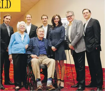  ?? AARON M. SPRECHER/INVISION FOR AMC/AP IMAGES ?? Former U.S. president George H.W. Bush, centre, sits between Heather Lind and former first lady Barbara Bush at a 2014 screening of the AMC series TURN in Houston. Lind has accused Bush of touching her and telling a dirty joke.