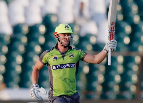  ?? Associated Press ?? ↑
Lahore Qalandars’ Chris Lynn celebrates after his century against Multan Sultans during their Pakistan Super League match in Lahore on Sunday.