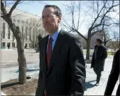  ?? JOSE LUIS MAGANA — THE ASSOCIATED PRESS FILE ?? AT&amp;T CEO Randall Stephenson leaves the federal courthouse in Washington.