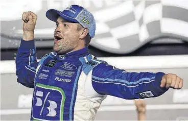  ?? [AP PHOTO] ?? Ricky Stenhouse Jr. celebrates in Victory Lane after winning the NASCAR cup auto race at Daytona Internatio­nal Speedway on Saturday in Daytona Beach, Fla.