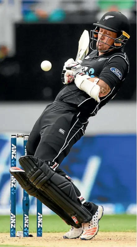  ??  ?? Luke Ronchi is dismissed as the ball glances his glove at Eden Park yesterday.