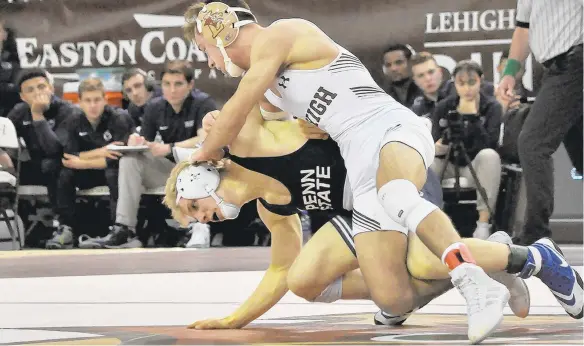  ?? APRILGAMIZ /MORNING CALLFILE PHOTO ?? Lehigh and Brandon Paetzell (top) need to make up for lost time during an abbreviate­d wrestling schedule this season.