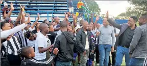  ?? (Pics: Mengameli Mabuza) ?? Mbabane Highlander­s Managing Director Chief Ally Kgomongwe (R) greeting the team’s supporters on Sunday.