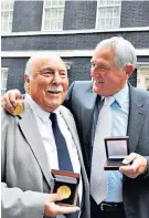  ??  ?? Overdue: Jimmy Greaves and Norman Hunter with World Cup winner’s medals in 2009